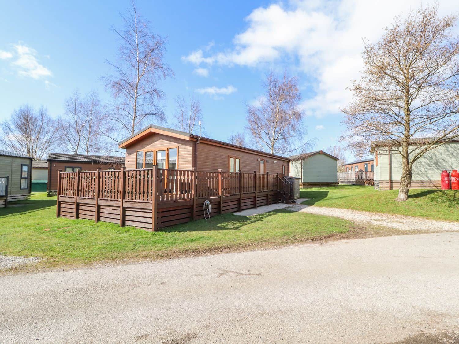 Duckling Lodge exterior with large deck area