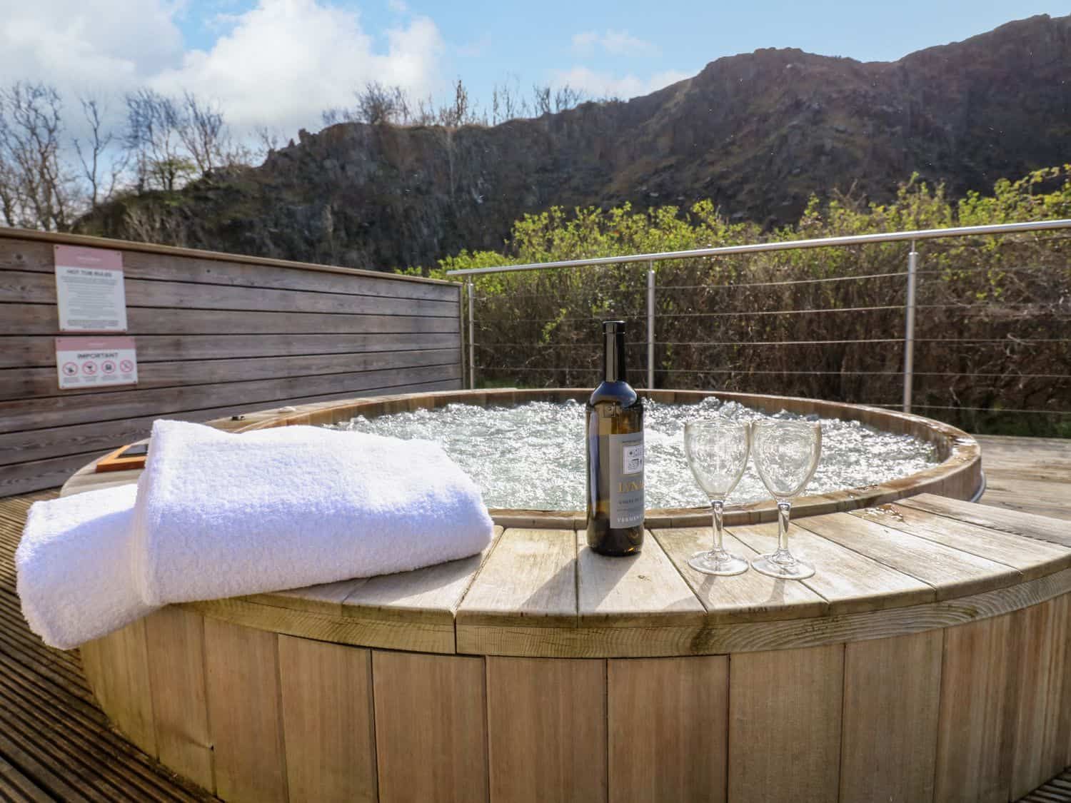 Private hot tub with views towards Bamburgh Castle at Restharrow Lodge