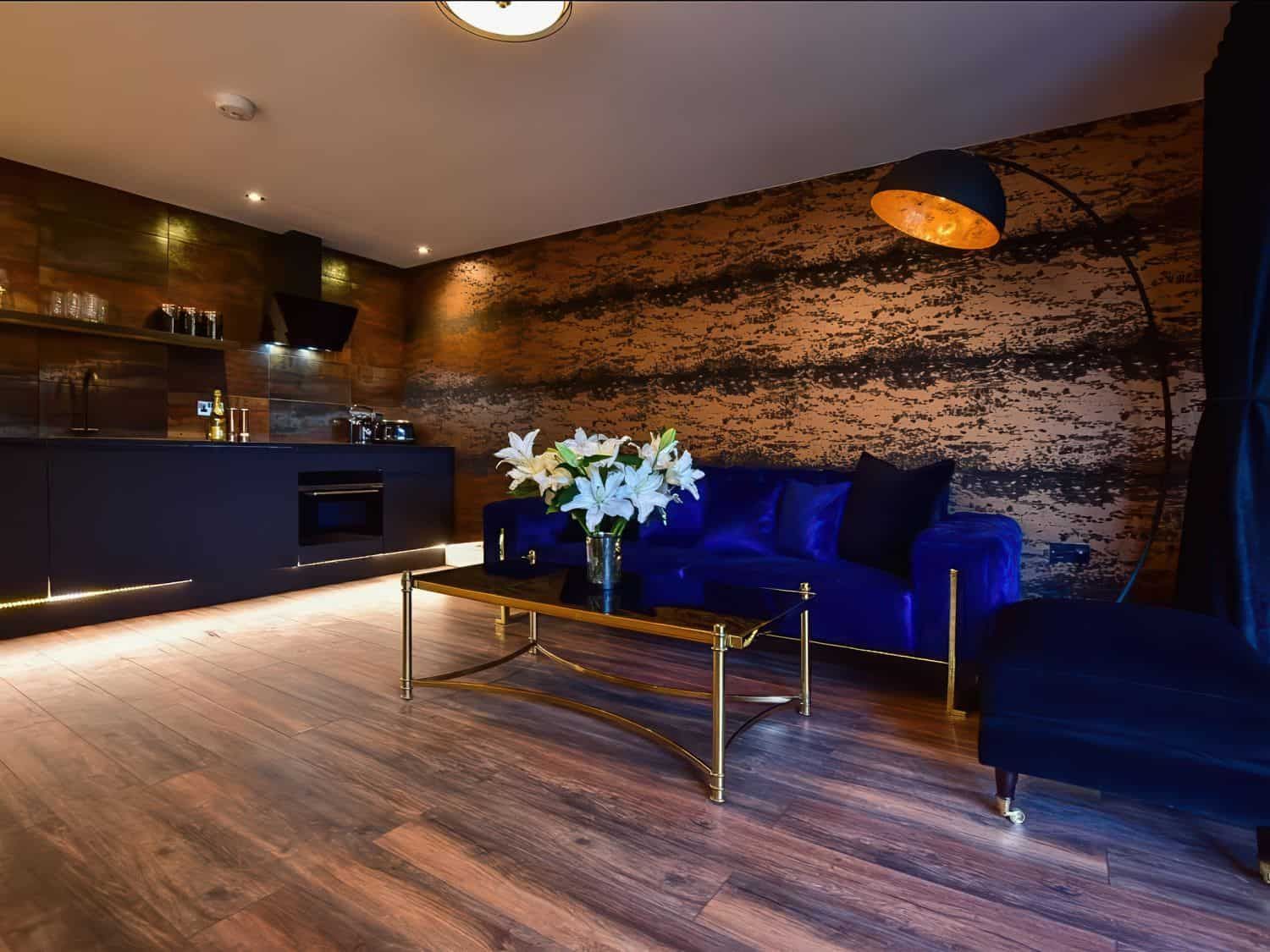 Stylish living area with modern furnishings at Wayside Lodge