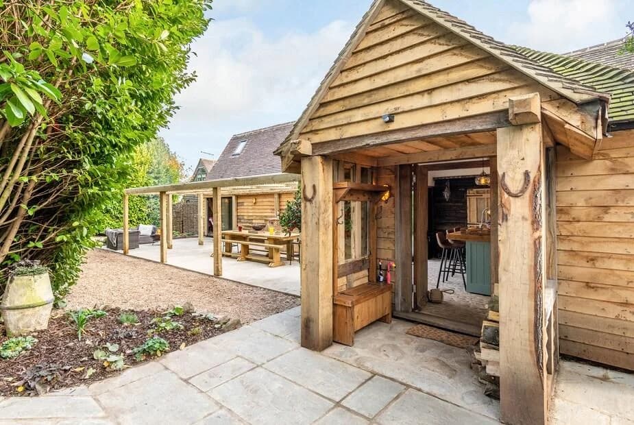 Old Shires Barn log cabin exterior in Kent