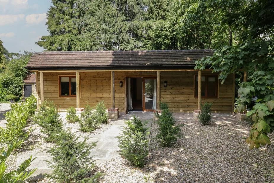 Yew Tree Cottage log cabin exterior in Kent