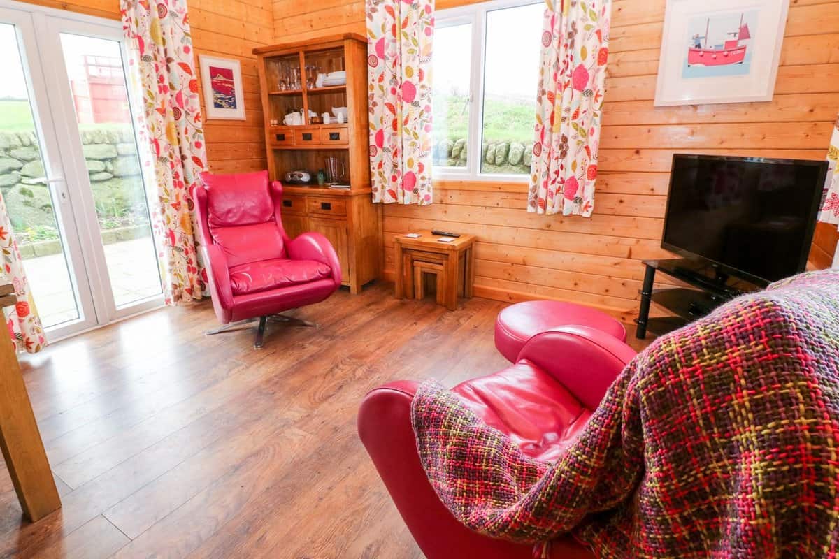 Stylish living area with modern amenities at Borah Lodge Cornwall