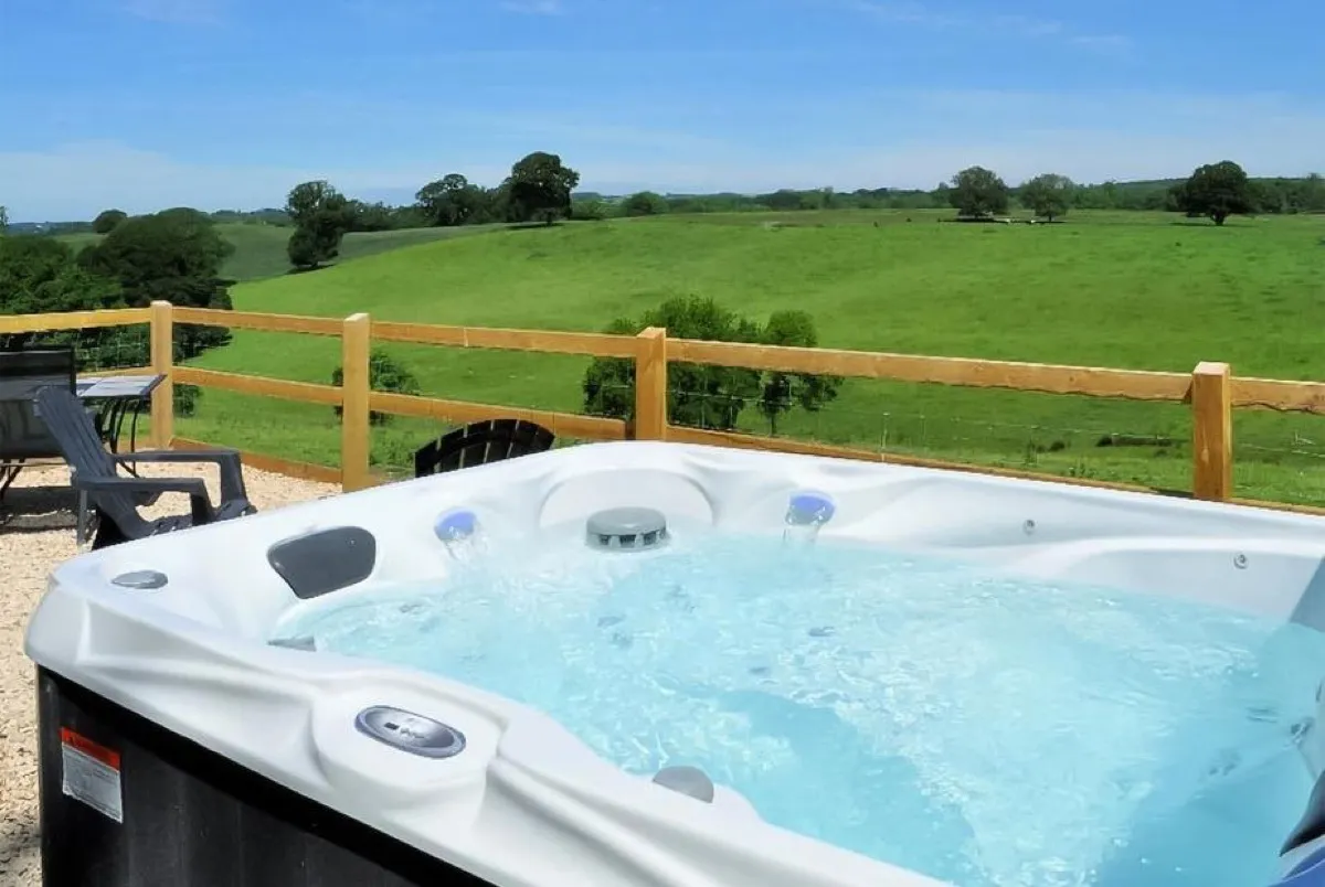 Private hot tub and firepit at Shepherds Hut Retreat